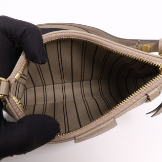 Louis Vuitton Empreinte Easy Pouch - Beige