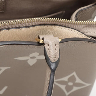 Louis Vuitton Giant Bicolor Empreinte Petit Pallas