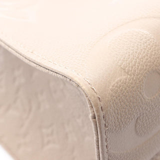Louis Vuitton On The Go MM - Giant Empreinte Beige
