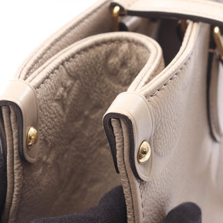 Louis Vuitton On The Go MM - Giant Empreinte Beige