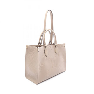 Louis Vuitton On The Go MM - Giant Empreinte Beige