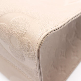 Louis Vuitton On The Go MM - Giant Empreinte Beige