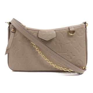 Louis Vuitton Empreinte Easy Pouch - Beige