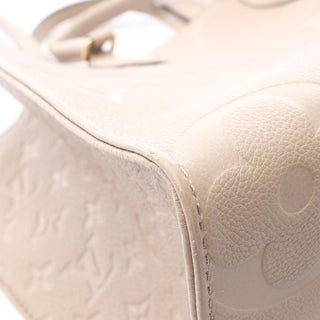 Louis Vuitton On The Go MM - Giant Empreinte Beige